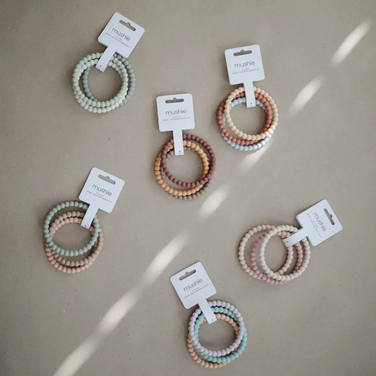 bijtring__set__armbanden_6.webp Mushie Zintuigen | Motoriek*Bijtring - Set 3 armbanden